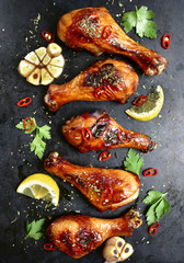 Grilled spicy chicken legs.Top view with copy space.