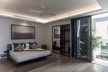 Naklejka na ściany i meble Panoramic view of nice white stylish modern bedroom
