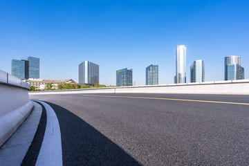 panoramic cityskyline with empty road