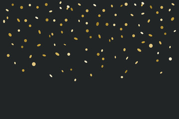 Golden confetti isolated on black background