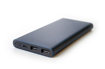 Powerbank new, powerful dark color with two usb inputs on a white background