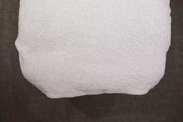 Towel on top of a massage table.