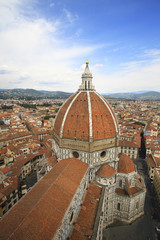 Fototapeta na wymiar Basilica di Santa Maria del Fiore and city panorama, aerial view, Florence, Tuscany, Italy; roofs, buildings and dome.