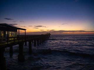 Naklejka na ściany i meble Sunset at the pier