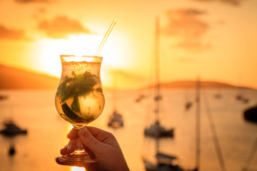 Sunset drink in the islands