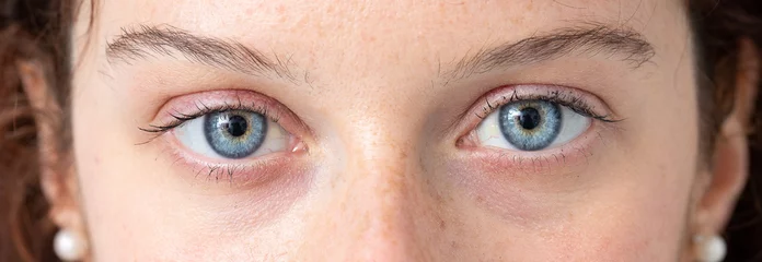 Fotobehang Blue eye of young caucasian woman © Alessandro Grandini