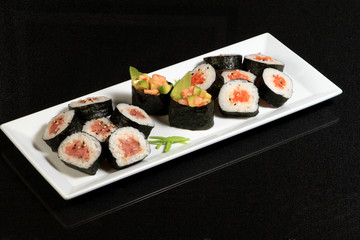 sushi over black background