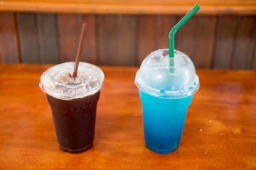 Iced black coffee and blue soda