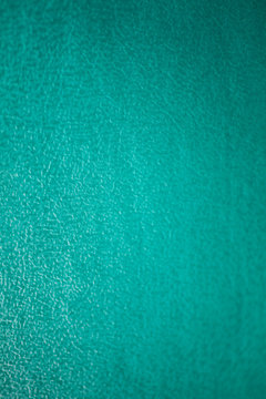 Abstract Dark Emerald Green Texture. Ribbed Fabrics Leather Background. Old Vintage Cloth.