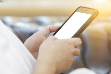 close up of woman's hands holding smartphone with blank copy space screen for put text or content, Modern lifestyle and luxury, Behavior of people in city.