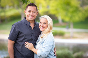 Fototapeta premium Young Caucasian Couple Portrait In The Park