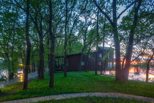 Wooden Cottage In Forest Near Lake, Cabin On Lake