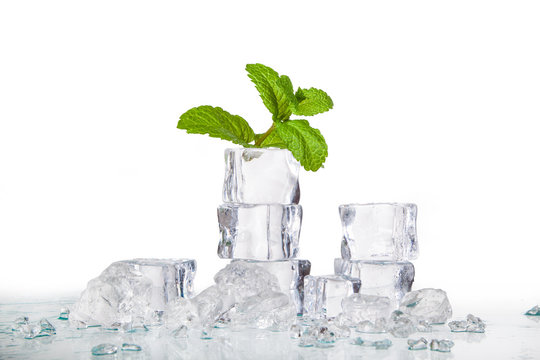 ice cubes and mint leaves isolated on a white background