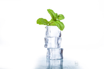 ice cubes and mint leaves isolated on a white background