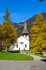 Fototapeta na wymiar Traditional church of village in Lauterbrunnen Valley, Bernese Highlands, Switzerland