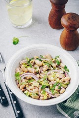 tuna salad with celery, white beans, red onion and parsley