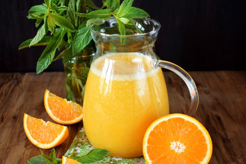 Orange juice in a glass jug 