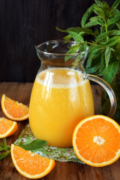 Orange juice in a glass jug 