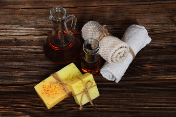 two musky-glycerine scented soaps and two argan oils and two towels for her and him for the home spa