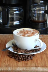 roasted coffee beans in a cup
