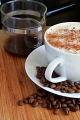 roasted coffee beans in a cup