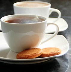 roasted coffee beans in a cup