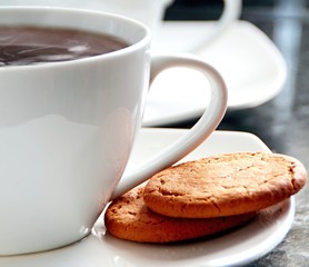 roasted coffee beans in a cup