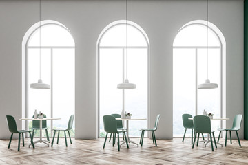 White arched window cafe interior - Powered by Adobe