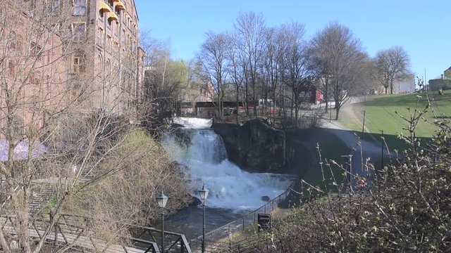 The largest waterfall of the Akerselva River in Oslo is the one near the cottage known as "H&oslash;nse-Lovisas hus", a small red house near the Beier bridge.