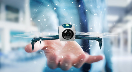 Businessman using modern drone 3D rendering