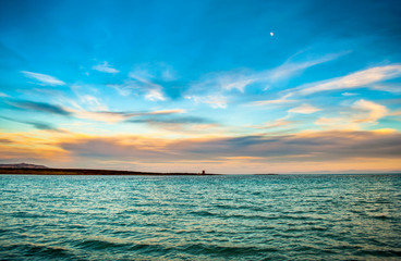 Obraz na płótnie Canvas Seascape of beach at sunset
