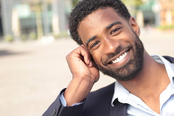 Beautiful businessman outside