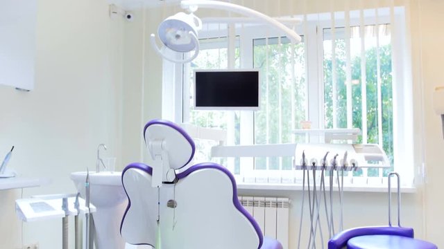 4k panning video of empty modern dentist clinic