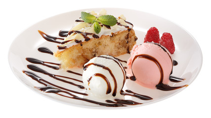 Apple biscuit cake and ice cream on plate isolated on white background