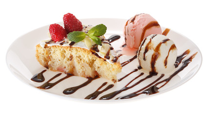 Apple biscuit cake and ice cream on plate isolated on white background