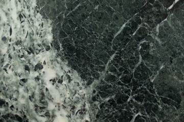 The dark green marble. Texture
