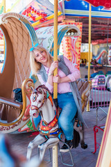 Fototapeta premium Happy smiling fashionable plus size young woman in modern city life. Life of xl lady. Concept of positive lifestyle. Pretty stylish girl at city center 