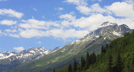 Obraz premium Caucasus mountains summertime. The Dombai mountain landscape
