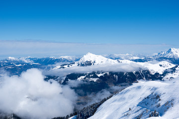 Fototapeta na wymiar Panoramic view of Alps from mountain above Kitzbuhel, Austria