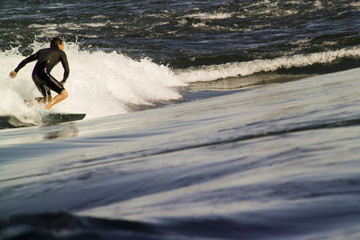 A man wakeboarding on the St. Lawrence river in Montreal,