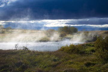 Deildartunguhver hot spring in Reykholtsdalur, Iceland. The most powerful thermal spring in Europe which water used for central heating. Nearby greenhouses use the geothermal heat to grow vegetables.