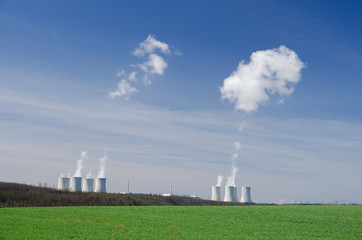 Spring landscape with cooling towers of nuclear power plant