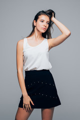 Fototapeta premium beautiful woman with serious face isolated on gray background