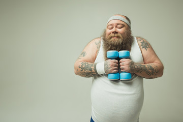 Man holding dumbbells