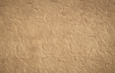 Abstract patterned light brown background texture cement wall