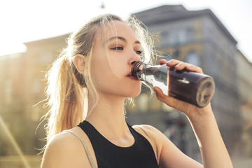 Thirsty girl drinking