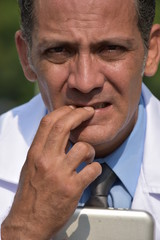 Worried Minority Male Surgeon