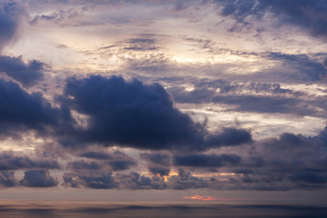 Colorful dramatic sky and clouds over the sea.