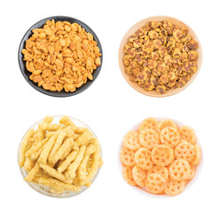 Indian Snack Food Collection Masala Peanuts, Chana Jor Garam, Crunchy Kurkure or Salty Wheels Snack isolated on white background