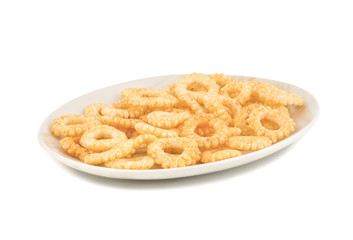 Yummy Round Shaped Yellow Snack Also Know as Round Ring Snack isolated on White Background